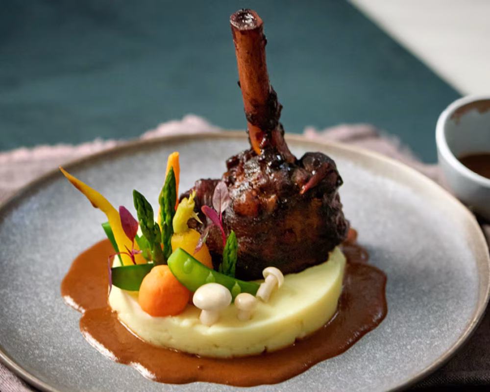 lamb-shank-with-rooibos-red-wine-jus-mash-and-baby-veg-main-header